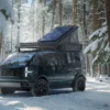 canoo pickup truck exterior in forest on snow