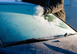 removing ice from a car windshield