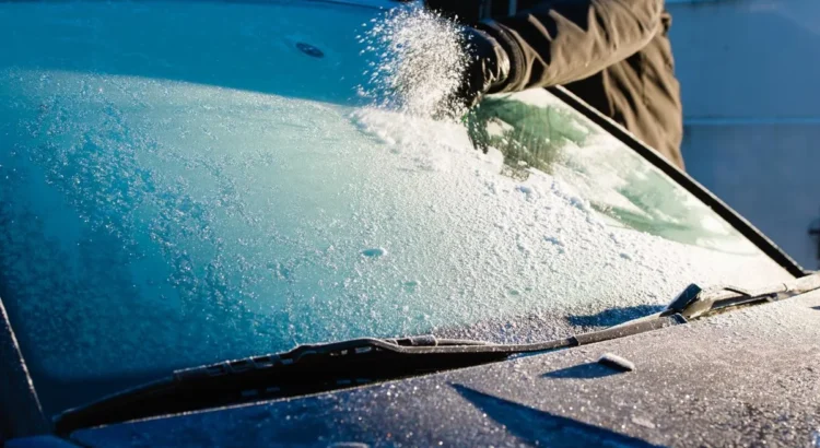 removing ice from a car windshield