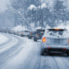 cars driving on a snowy road