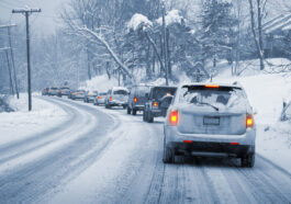 cars driving on a snowy road