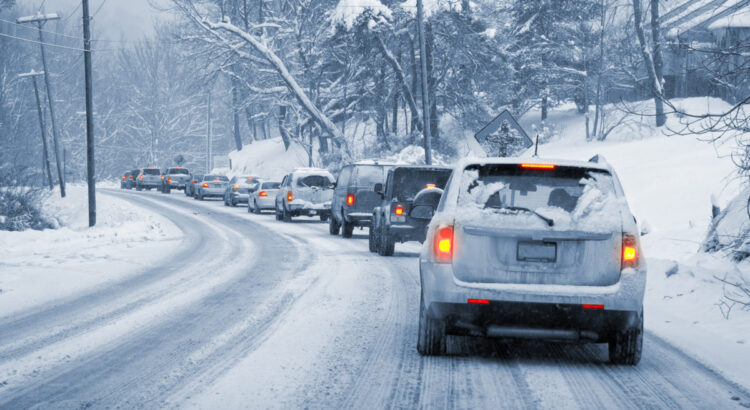 cars driving on a snowy road