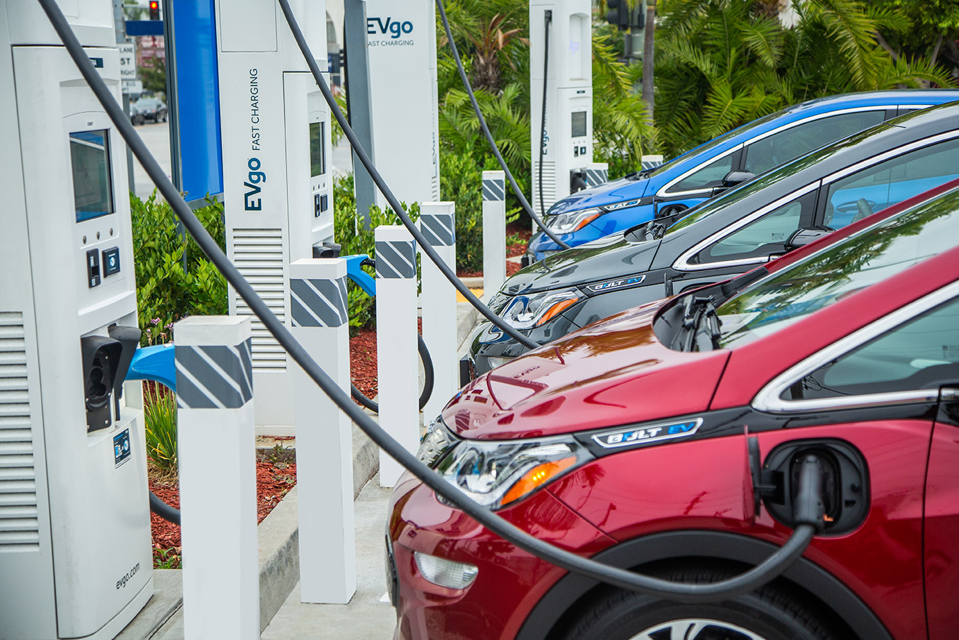 electric cars are charged at electric stations