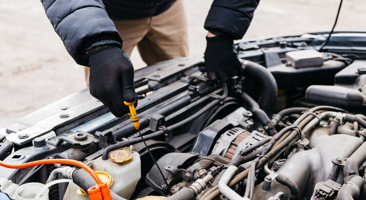 checking the oil in a car