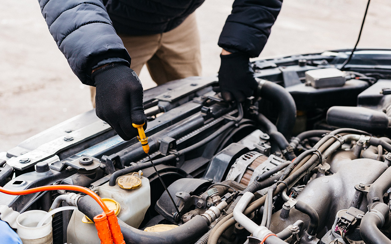 checking the oil in a car