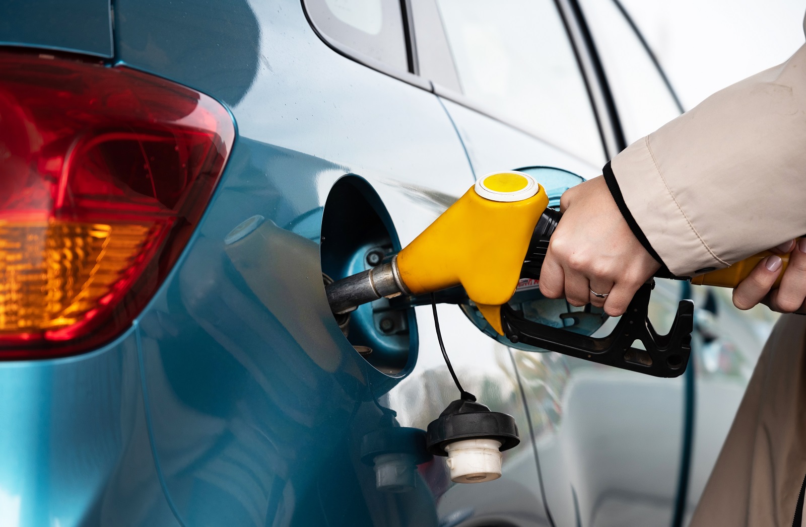 Attractive,Young,Woman,Refueling,Car,At,Gas,Station.,Female,Filling