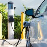 white electric car charging
