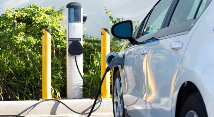 white electric car charging