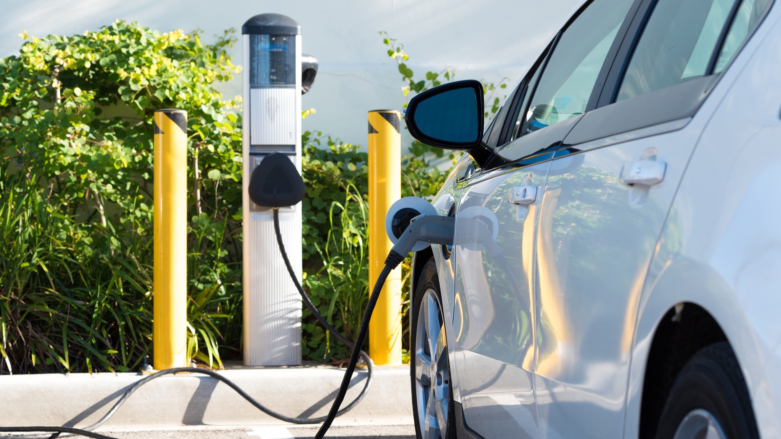 white electric car charging