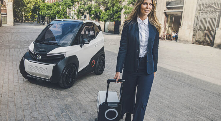 woman in front of Silence S04 with car battery